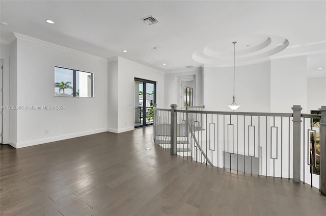 hall featuring dark hardwood / wood-style floors and crown molding