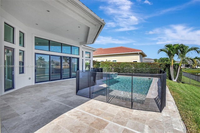 view of pool featuring a patio area