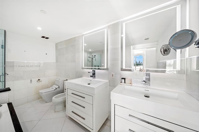 bathroom featuring vanity, a bidet, tile patterned flooring, tile walls, and walk in shower