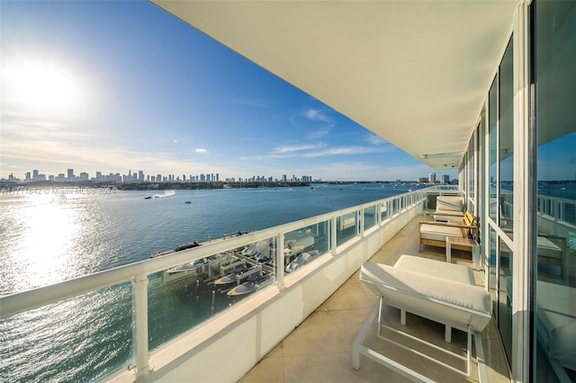 balcony featuring a water view