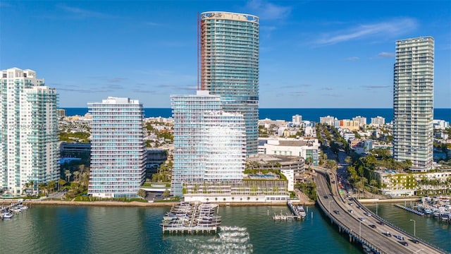 property's view of city featuring a water view