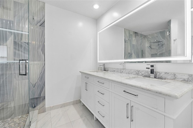 bathroom with vanity and walk in shower