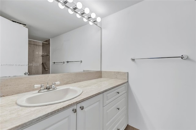 bathroom featuring vanity and walk in shower