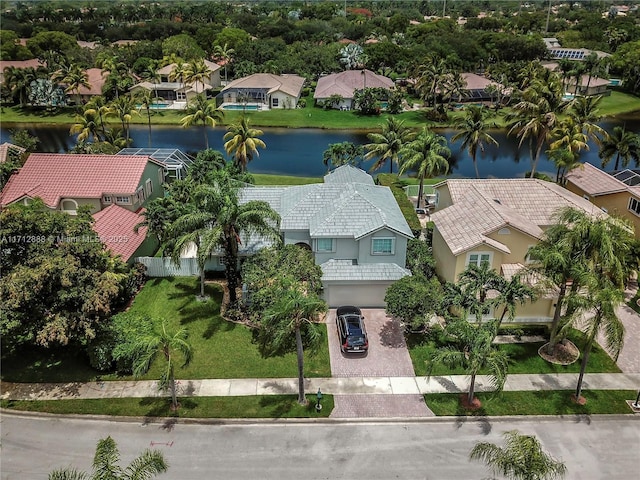 bird's eye view with a water view