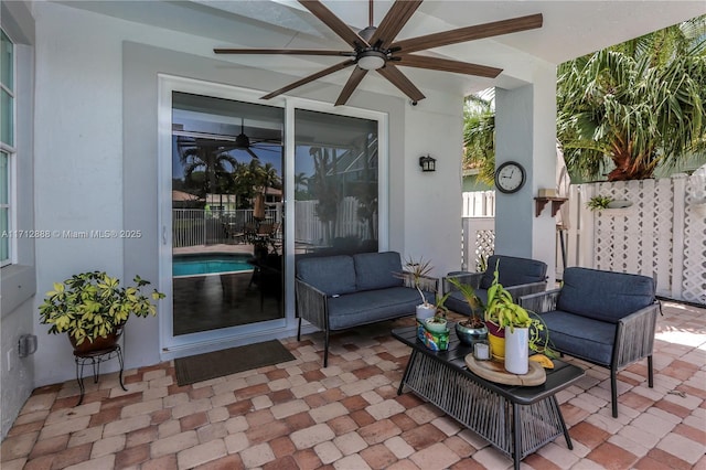 view of patio / terrace featuring an outdoor living space and ceiling fan