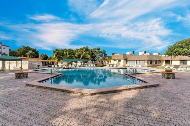 view of pool featuring a patio