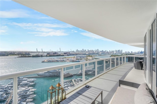 balcony featuring a water view