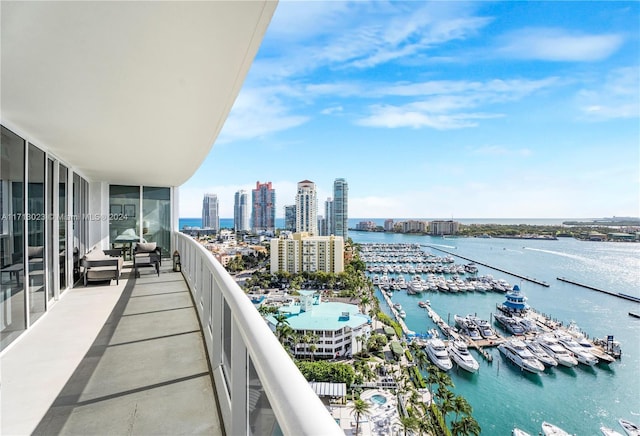 balcony featuring a water view