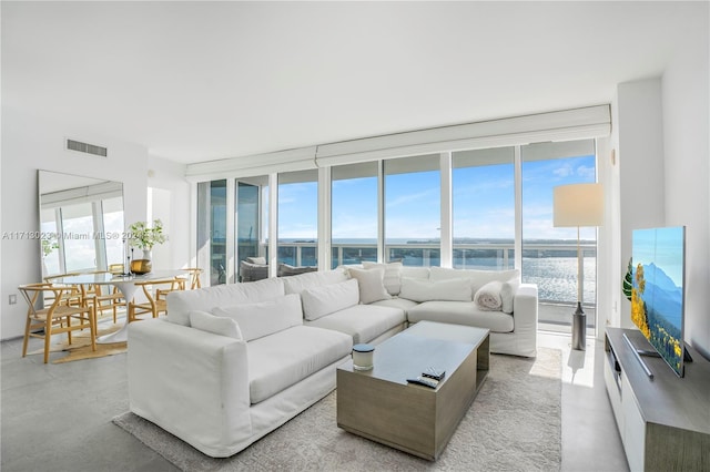 living room with a wall of windows