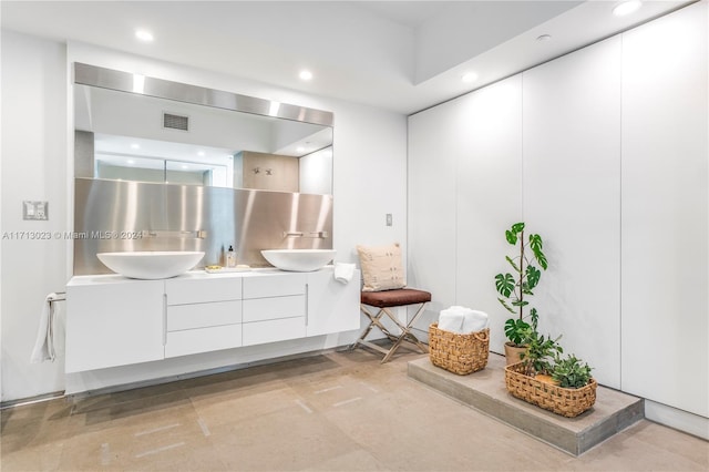 bathroom with backsplash and vanity