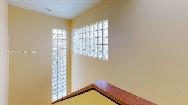 interior details with a textured ceiling