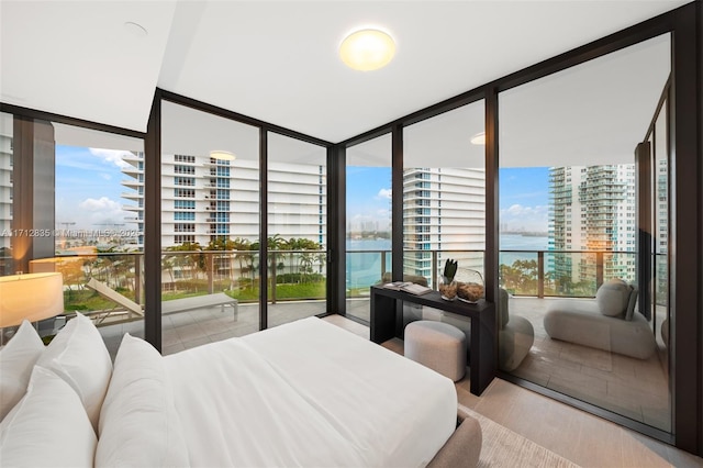 bedroom featuring expansive windows