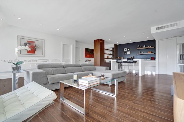 living room featuring dark hardwood / wood-style flooring