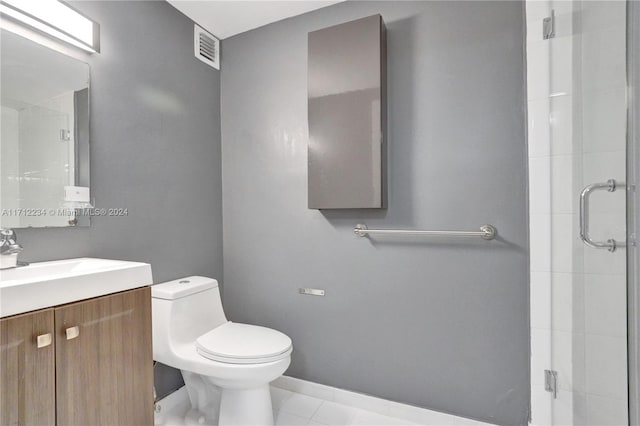 bathroom with walk in shower, tile patterned flooring, vanity, and toilet