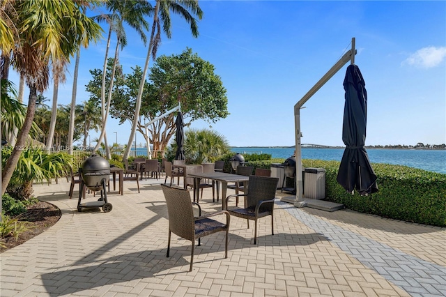 view of patio / terrace featuring a water view