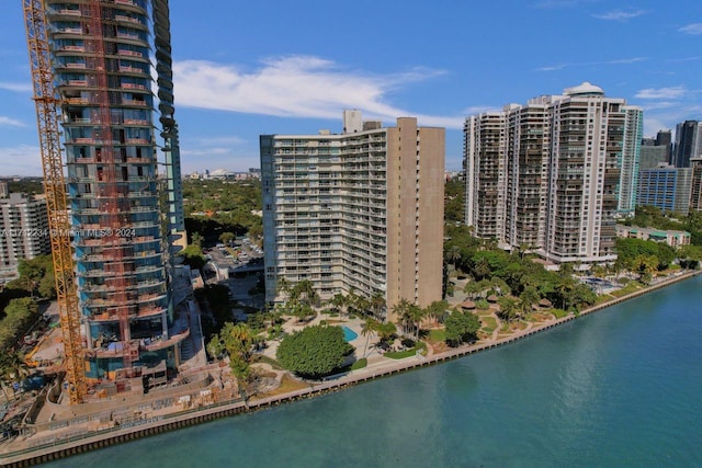 view of building exterior with a water view