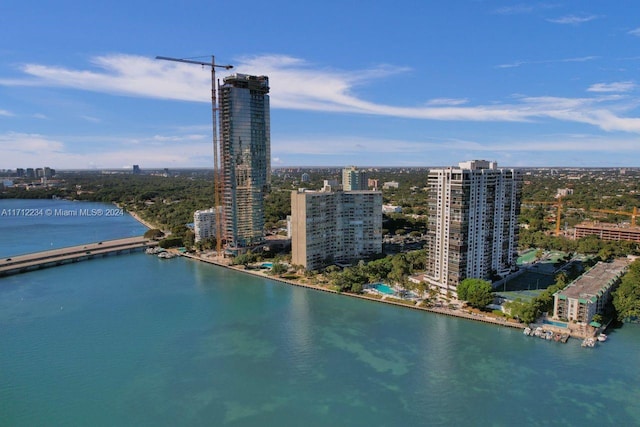 birds eye view of property featuring a water view