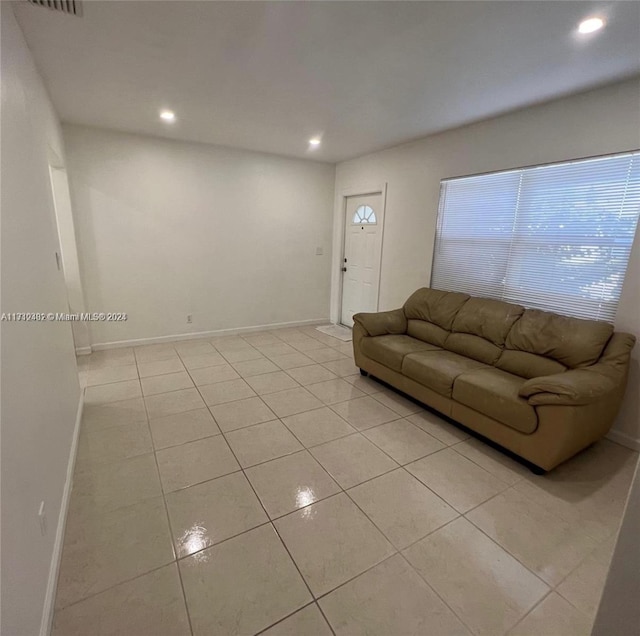 living room with light tile patterned floors