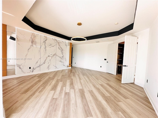 unfurnished room featuring hardwood / wood-style floors