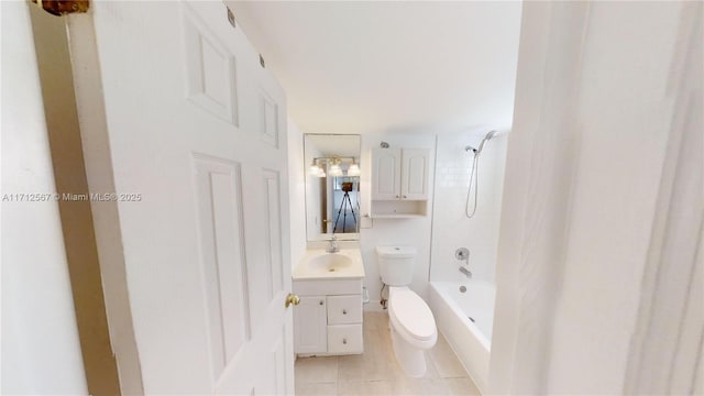 full bathroom featuring vanity, toilet, tile patterned flooring, and tiled shower / bath