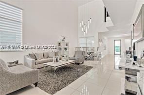 living room with tile patterned floors