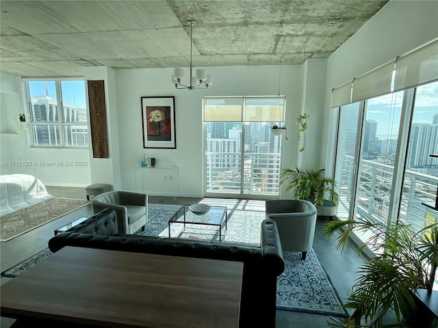 living room featuring a city view and a chandelier