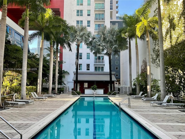 community pool with a patio