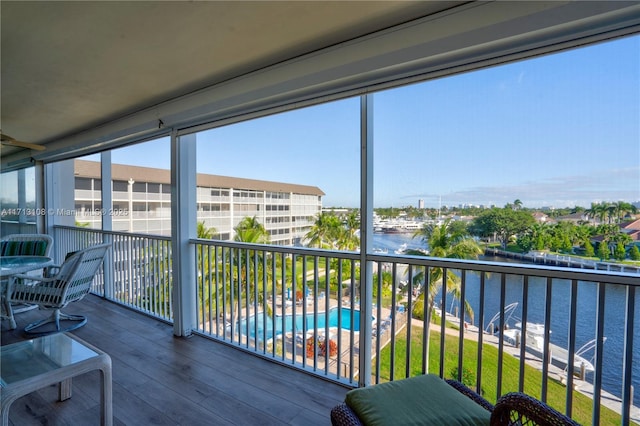 balcony featuring a water view