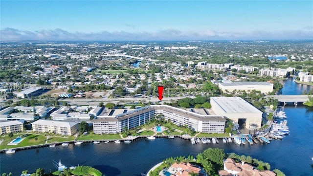 birds eye view of property featuring a water view