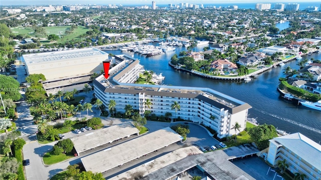 bird's eye view with a water view and a view of city