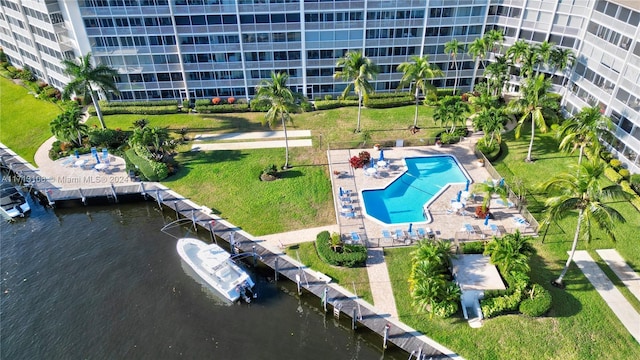 birds eye view of property with a water view