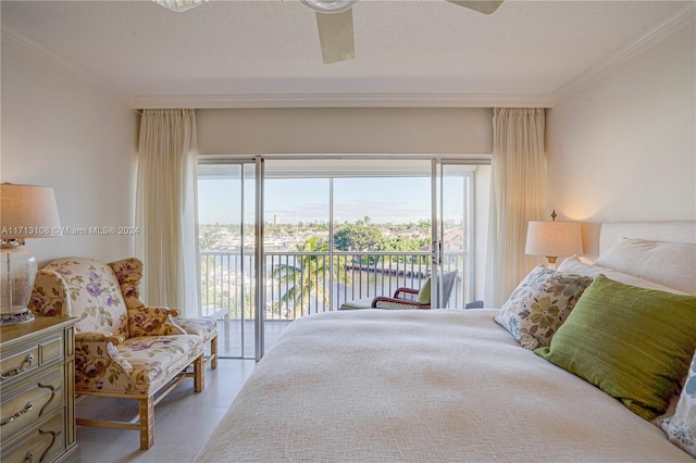 bedroom featuring a water view, crown molding, ceiling fan, access to exterior, and a textured ceiling