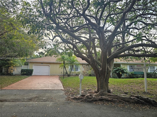 ranch-style home with a garage