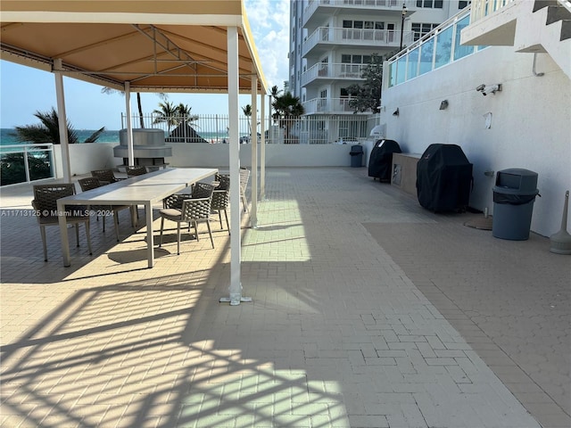 view of patio featuring a gazebo and a grill