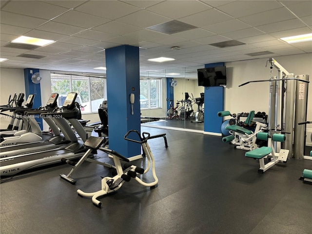 gym featuring a drop ceiling