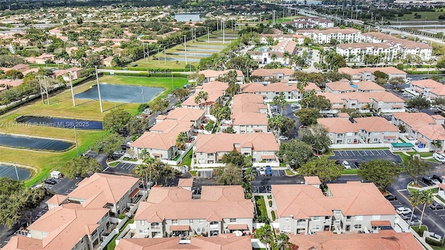 bird's eye view with a residential view and a water view