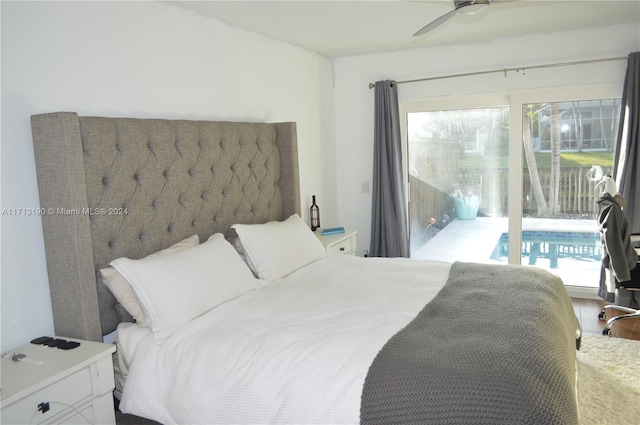 bedroom featuring access to exterior, hardwood / wood-style floors, and ceiling fan