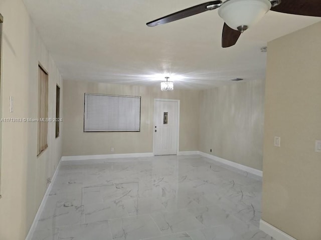 spare room featuring ceiling fan