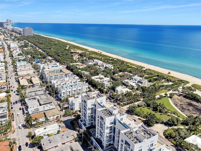 aerial view featuring a water view and a beach view