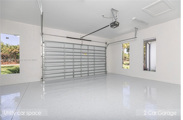 garage featuring a garage door opener