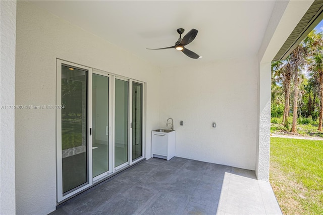 view of patio / terrace with sink and ceiling fan