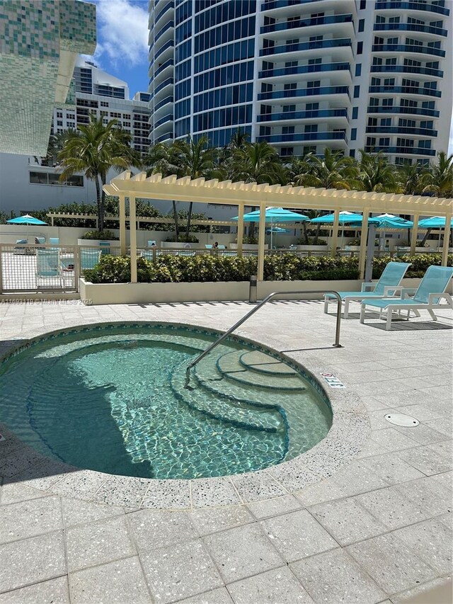 2501 S Ocean Dr Unit 1208, Hollywood, FL 33019 - view of pool featuring a pool, a patio area, and a pergola