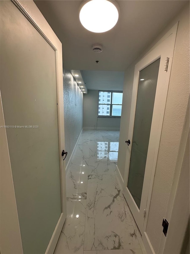 2501 S Ocean Dr Unit 1208, Hollywood, FL 33019 - hall with marble finish floors and baseboards