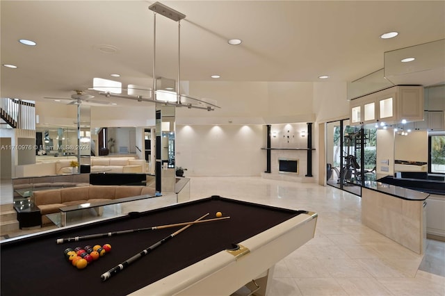 game room with light tile patterned floors, ceiling fan, and pool table