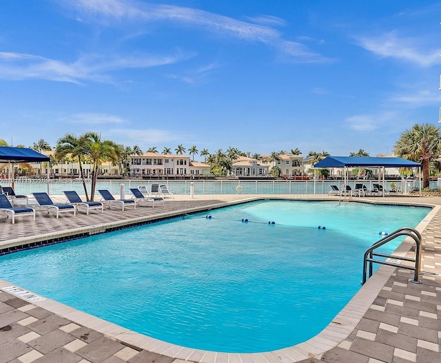 view of swimming pool with a patio area