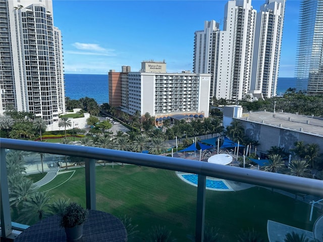 balcony featuring a water view