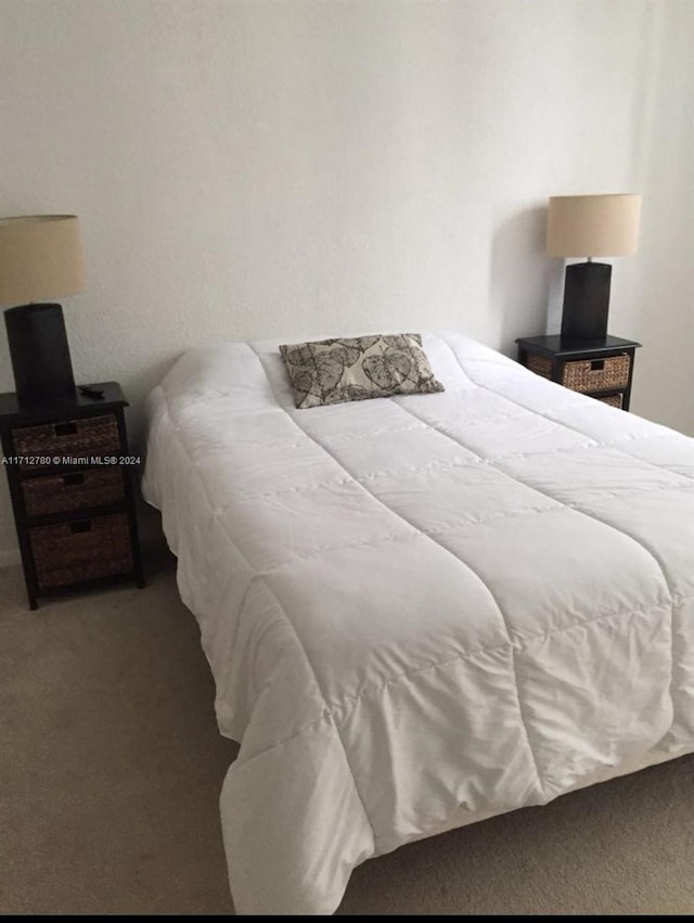 bedroom featuring carpet flooring