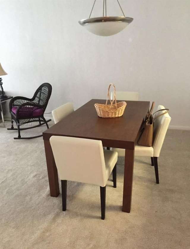 view of carpeted dining room