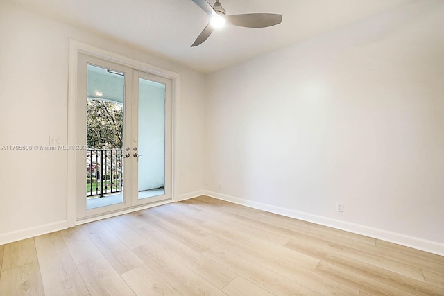 spare room featuring ceiling fan and light wood-type flooring