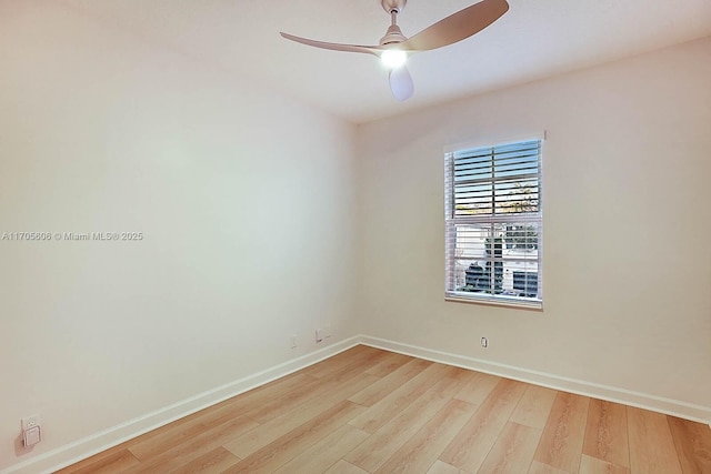 spare room featuring light wood-type flooring and ceiling fan